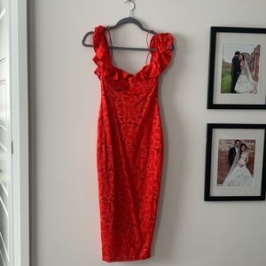 Tight fitting lace red dress. Size medium.